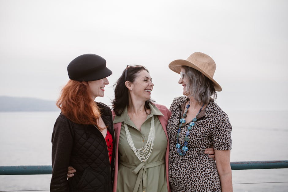A group of people of different ages smiling together
